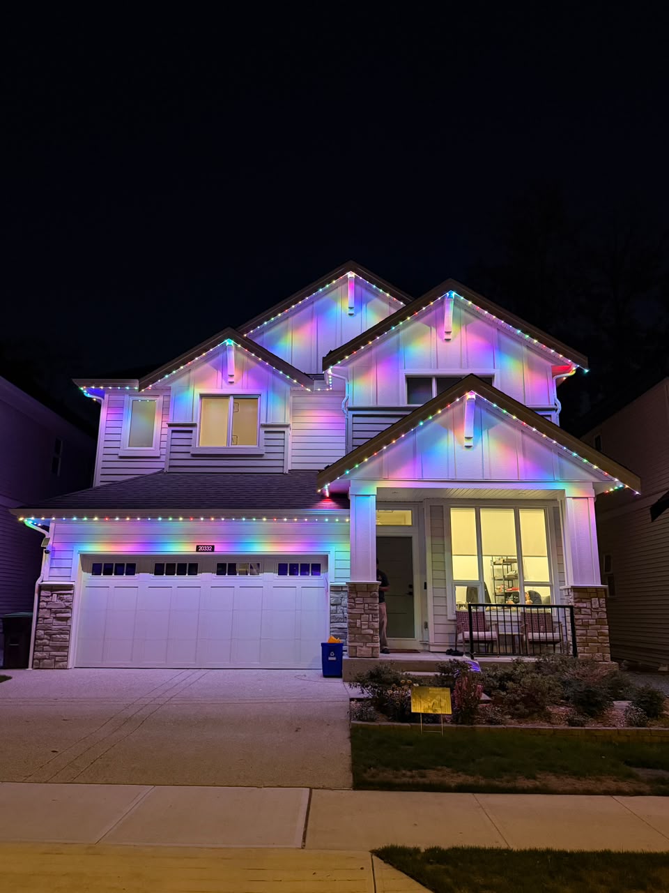 Home lit with brilliant multi-tiered rainbow color spectrum.