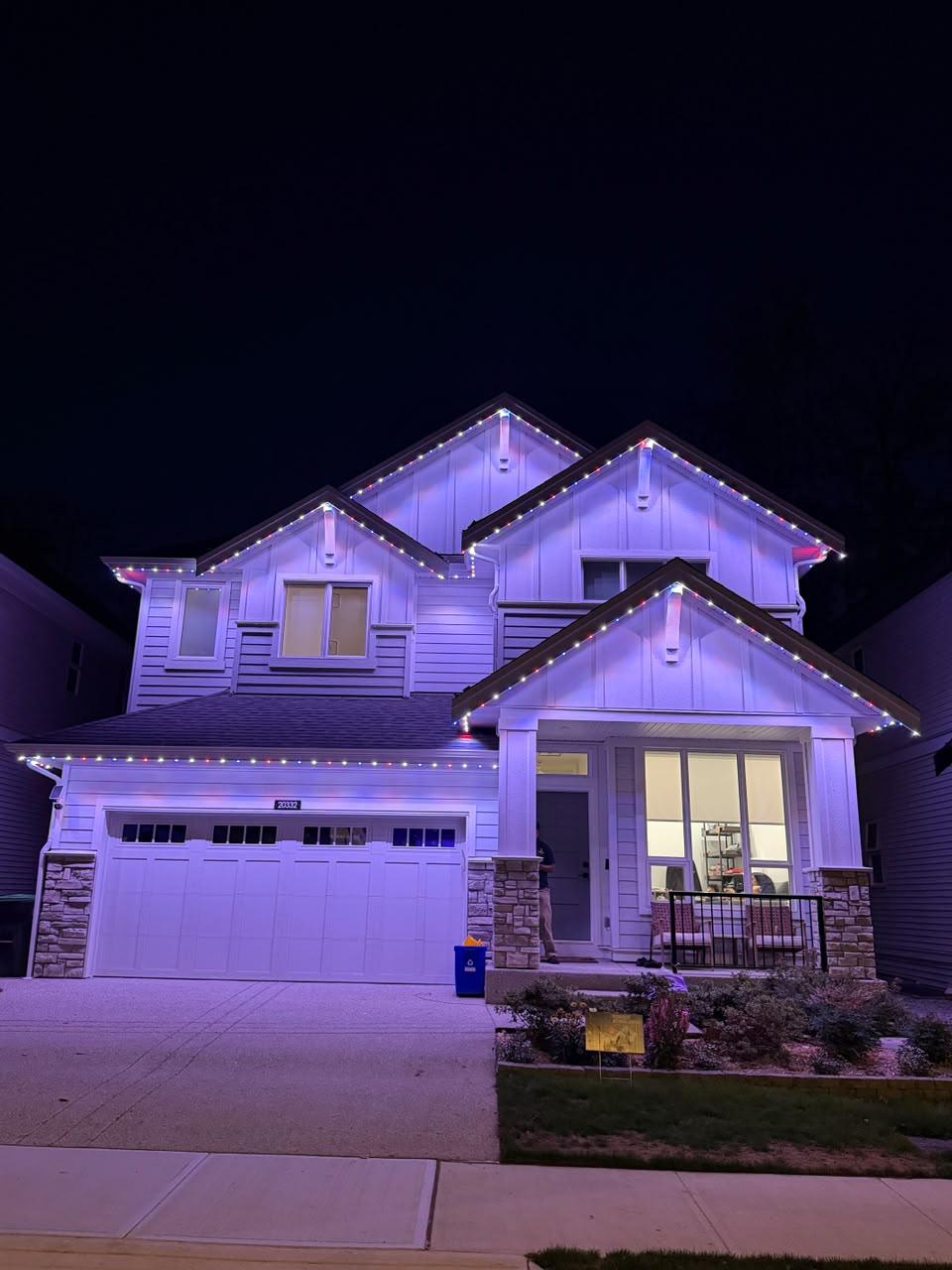 A home in Courtenay showing game night blue and green team lighting.